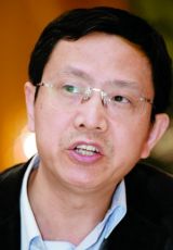 贾康：中国属于巨国模型