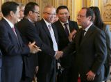 法国总统呼吁通过谈判解决中欧贸易争端