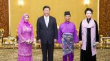 习近平会见马来西亚最高元首哈利姆