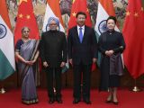 习近平会见印度总理辛格
