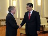 习近平会见国际奥委会主席巴赫
