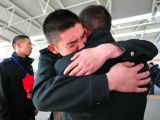各地老兵光荣退伍返乡
