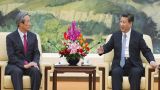 习近平分别会见韩国国会代表团和法国外长