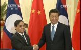 习近平会见老挝总理