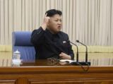 金正恩召开军委扩大会议表情丰富