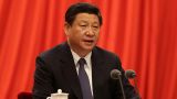 习近平：从“两岸一家亲”理念出发 没什么困难不能克服