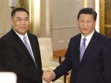 习近平会见崔世安