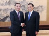李克强会见哈萨克斯坦国防部长