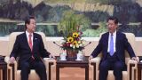 习近平会见韩国新国家党党首