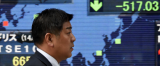 经济逆风吹冷“安倍经济学”