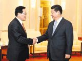 习近平会见韩国国会议长郑义和