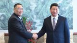 习近平会见崔世安