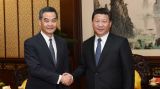 习近平会见梁振英