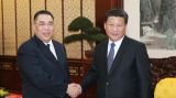 习近平会见崔世安