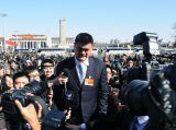 两会快印象：“采访争夺战”