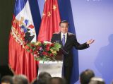 李克强与智利总统巴切莱特共同出席中智建交45周年经贸研讨会开幕式