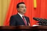 从《2016年政府工作报告》看政府自身建设和行政体制改革