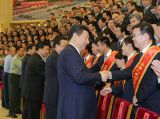 习近平会见第七次全国人民防空会议代表