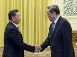 俞正声会见老挝人革党代表团