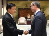 刘云山会见美国高通公司总裁阿伯利