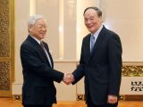 王岐山会见越共中央总书记阮富仲
