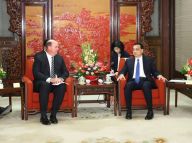 李克强会见出席第九轮中美工商领袖和前高官对话的美方代表