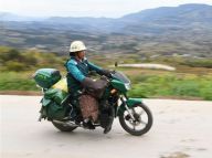 山村里的女“绿衣信使”