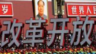 将改革开放进行到底