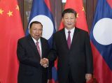 习近平同老挝人民革命党中央总书记、国家主席本扬举行会谈