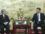 习近平会见越共中央政治局委员、中央书记处常务书记陈国旺