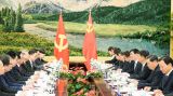 王沪宁同越共中央政治局委员、中央书记处常务书记陈国旺举行会谈