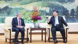 习近平会见国际奥委会主席巴赫