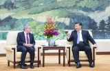习近平会见国际奥委会主席巴赫