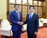 栗战书会见卡塔尔埃米尔塔米姆