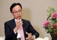 香港特区政府政制及内地事务局局长：发挥“一国两制”优势 以创新思维破除“跨境壁垒”