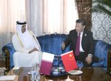 习近平会见卡塔尔埃米尔塔米姆