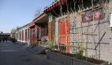在“不忘初心、牢记使命”主题教育中把“街乡吹哨、部门报到”的改革推向高质量发展水平