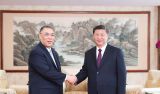 习近平会见崔世安
