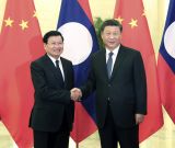 习近平会见老挝总理通伦