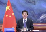 栗战书同日本众议长大岛理森举行会谈