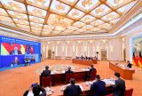 李克强与德国总理默克尔同出席第十届中德经济技术合作论坛的两国经济界代表见面