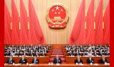 十四届全国人大三次会议在京开幕 习近平等在主席台就座